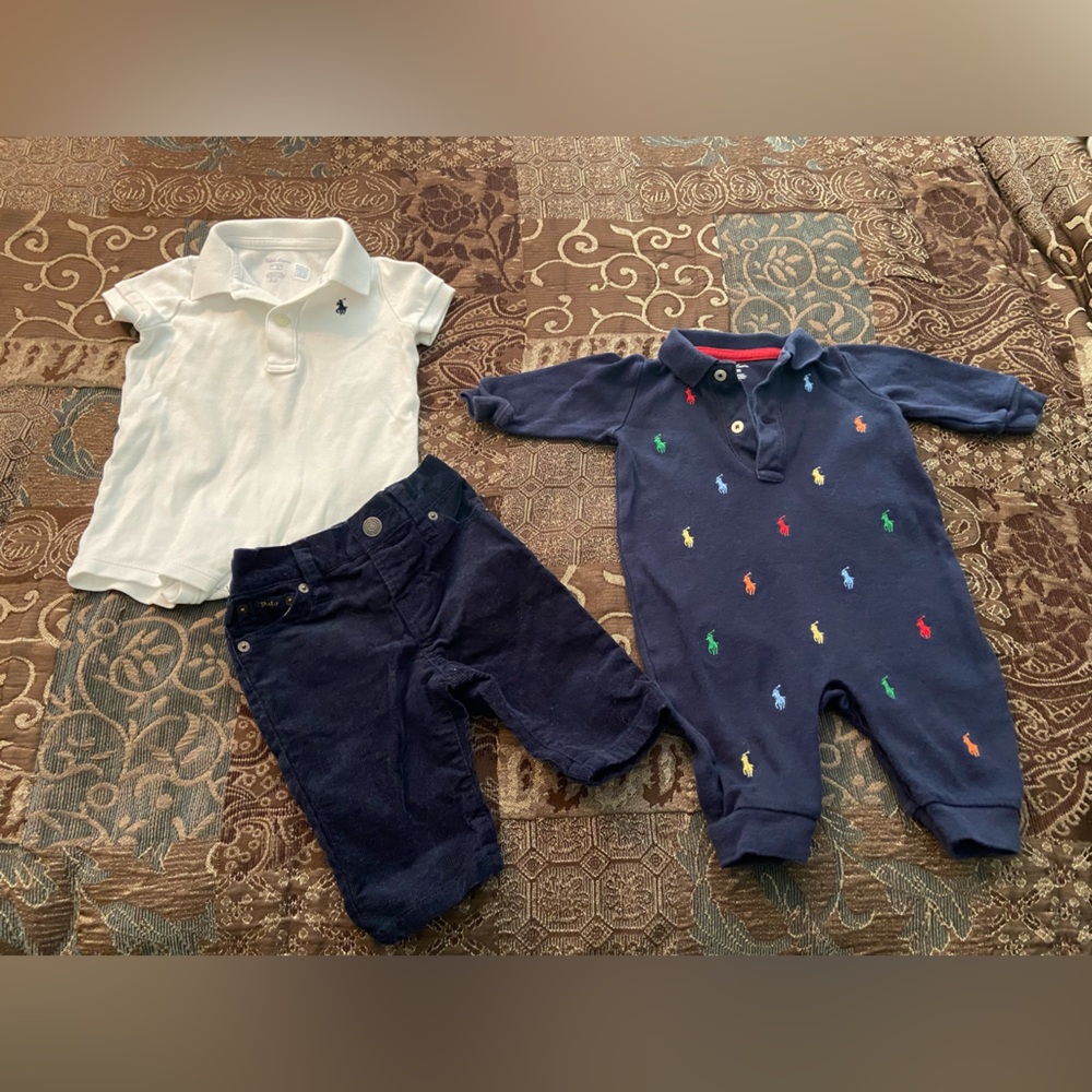 Ralph Lauren Baby Boy Schiffli jumper & white onesie with blue corduroy jeans.
